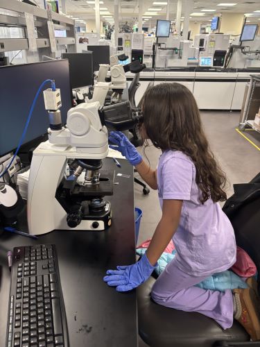 Susan's granddaughter, Ava, is one of her favorite lab trainees.